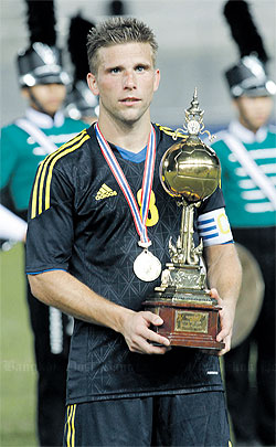 Sweden captain Anders Svensson with the King’s Cup after beating Finland. (Photo: The Bangkok Post)