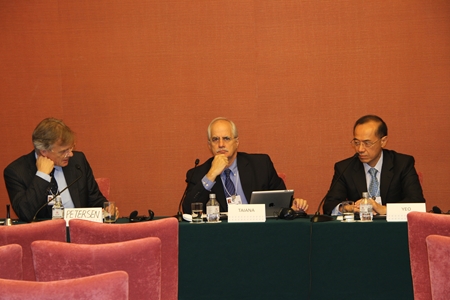 Ambassador Friis Arne Petersen (left) moderates a panel of the 2013 World Peace Forum