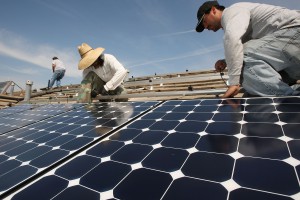 Work Crew Installs Solar Power Panels In Santa Monica