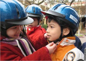 101609_Vietnam-Helmets-Kids_500