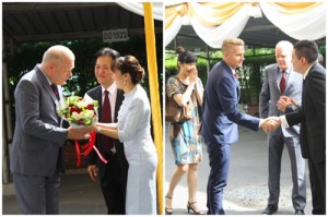 Ambassador Mikael H. Winther is welcomed with flowers as he arrives at the morning ceremony with Commercial Counsellor, Asbjørn Overgaard Christiansen, and Senior Commercial Officer, Nantima Angkatavanich 