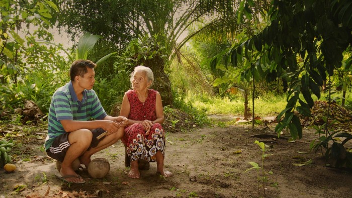 Adi and his mother, Rohani, share a solemn moment in Drafthouse Films’ and Participant Media’s The Look of Silence. Courtesy of Drafthouse Films and Participant Media. 