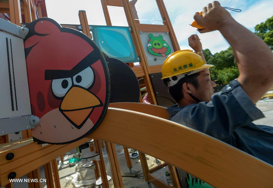 A worker is seen at an Angry Birds theme park in Haining, East China's Zhejiang province. The Angry Birds theme park, the first of its kind in China, is under construction and is expected to open to the public in October. [Photo/Xinhua]