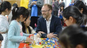 LEGO CEO Jørgen Vig Knudstorp, with a group of children in China.