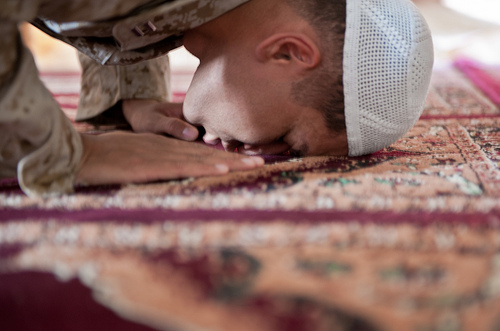 110820-N-TH989-166: Lt. Asif I. Balbale, the chaplain for Assault Amphibian School Battalion at Marine Corps Base Camp Pendelton, Calif., prays by himself at the Afghan Cultural Center aboard Camp Leatherneck, Helmand province, Aug. 17. During the Islamic holy month of Ramadan, Balbale ministered to Muslims throughout the provinces of Helmand and Kandahar.