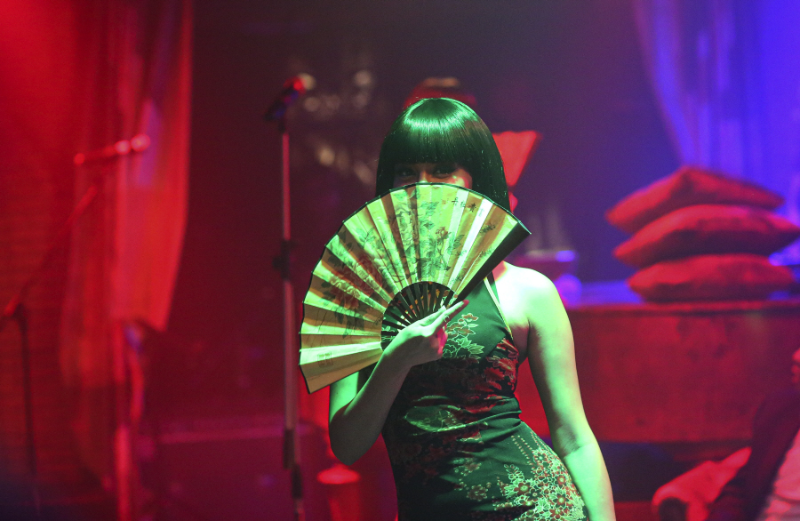 Lady in Chinese dress, in Bangkok's nightlife. Photo: Dennis Thern.