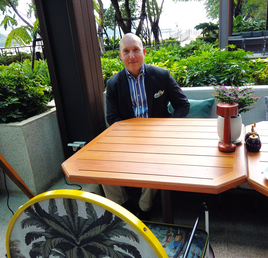 Michel Gunnar Eberhardt at the outdoor area of Palmier restaurant by Chao Phraya river in Bangkok