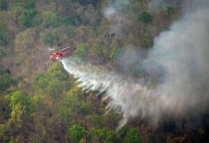 Water being dropped on wildfire spots in Chiang Mai. Photo: Bangkok Post