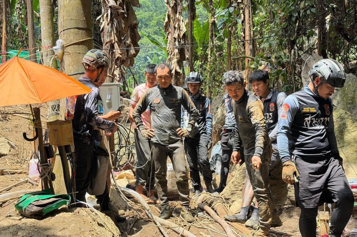 Search for two missing men in Laos cave called off